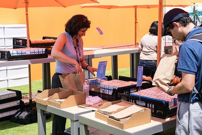 Cisco Live attendee volunteers at the Social Impact Zone